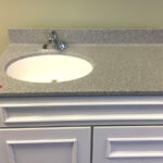 SFI's Roma brand, cultured granite bathroom vanity sink top in the color 1252 Mont Blanc with a matte finish.