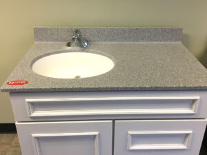 SFI's Roma brand, cultured granite bathroom vanity sink top in the color 1252 Mont Blanc with a matte finish.